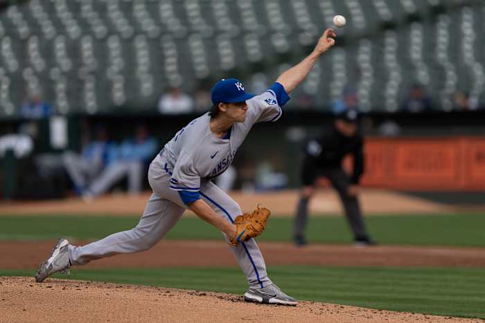 Kansas City Royals starting pitcher Daniel Lynch (52) pitches during the first inning against the Oakland Athletics at RingCentral Coliseum.